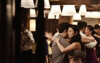 couple dancing tango at an intimate milonga