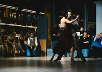 profesional tango couple dancing in exhibition