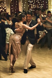 profesional tango couple dacing in a millonga