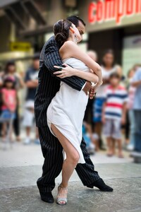 tango couple dancing in the street